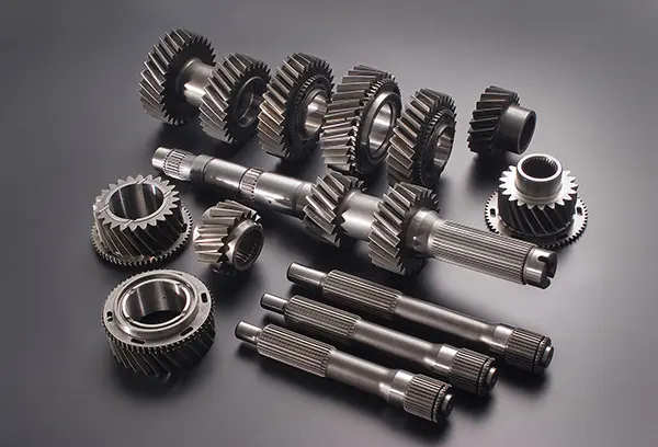 Performance transmission gears and shafts arranged for assembly