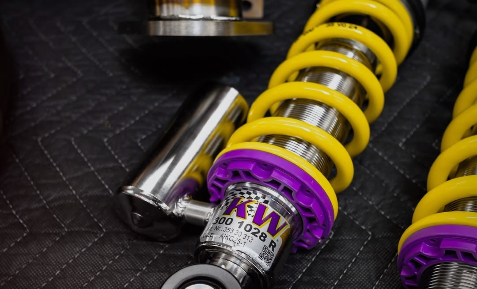 Adjustable coilover suspension components prepared for installation